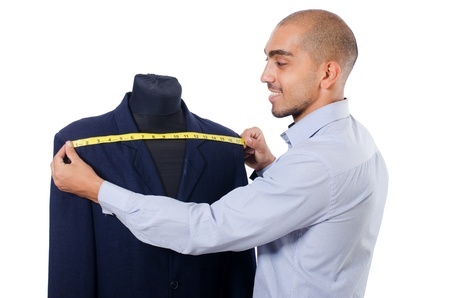 an image of a man measuring accross the shoulders of a tailored jacket #learntosew #howtosew.